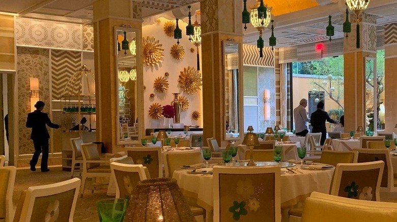 interior of the dining room with golden hues