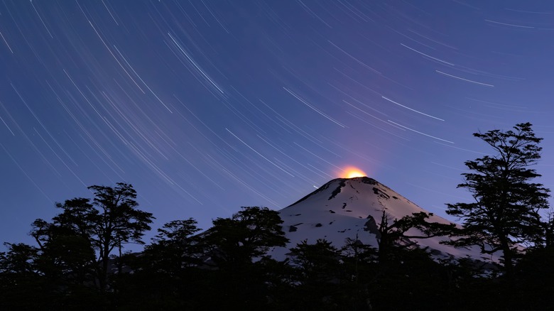 Villarrica Volcano growing in the dark with stars timelapse