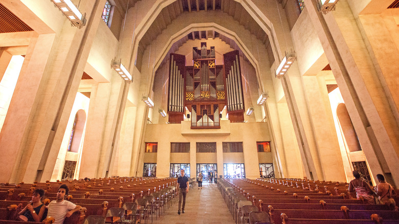 interior view of the church with pews and its large organ