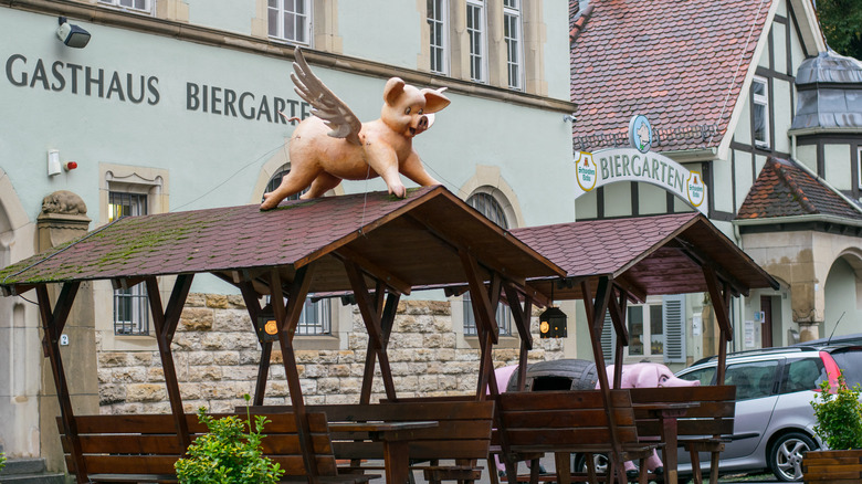 Covered restaurant tables at the Pig Museum in Stuttgart