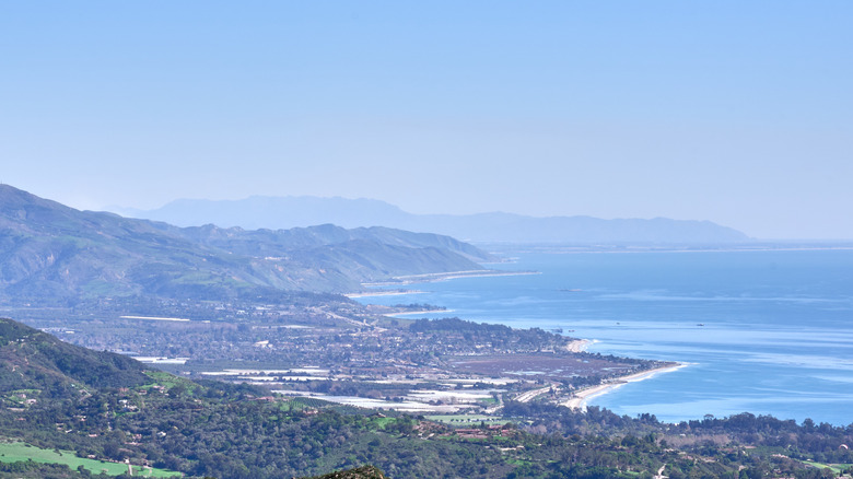 view from the mountains overlooking the small town of Carpinteria and the ocean