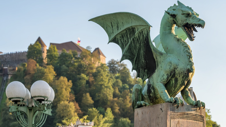 Green dragon sculpture at Ljubljana Castle looking over the city of Ljubljana, Slovenia