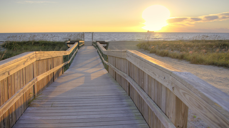 Tybee Island sandy beach with a boardwalk at sunrise