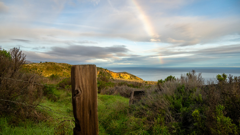 Santa Cruz Island in the Channel Islands National Park, with a rainbow in the sky