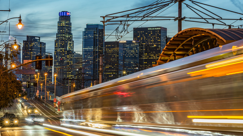 Train in motion within city