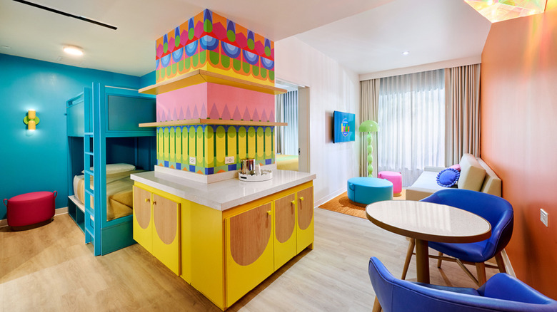 Artist rendering of a colorful suite with bunk beds, catering to a child's tastes.