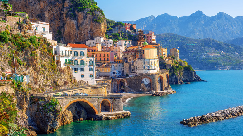 View of a town on the Amalfi Coast with colorful cliffside houses overlooking the water