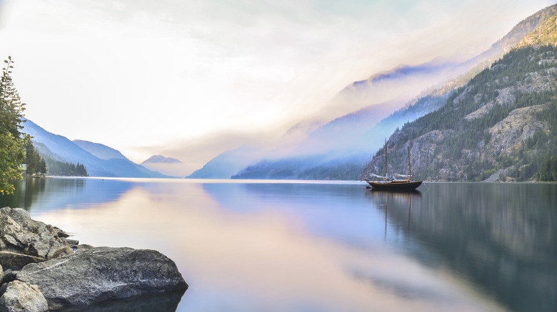 A sunrise on foggy Lake Chelan from Stehekin