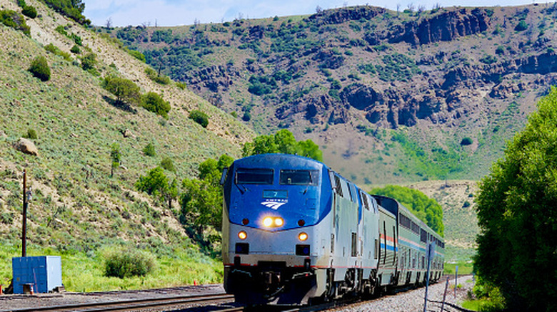 train passing through Hot Sulpher Springs in summer