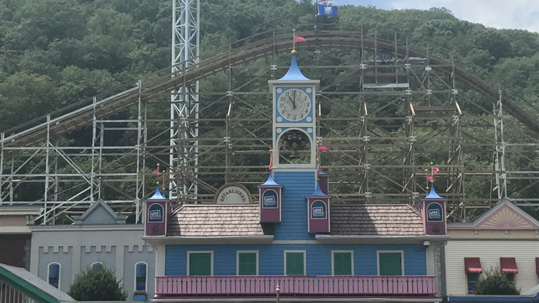 A wooden coaster in the background of Lake Compounce theme park