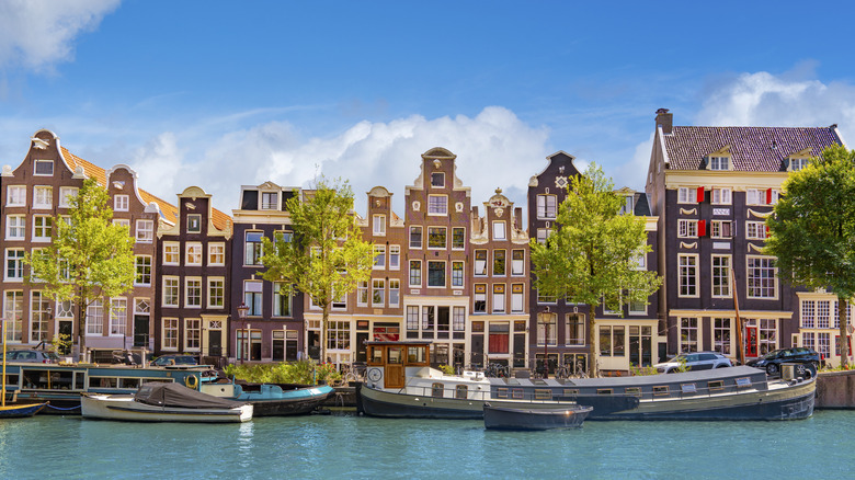 Boats and homes along Amsterdam canal