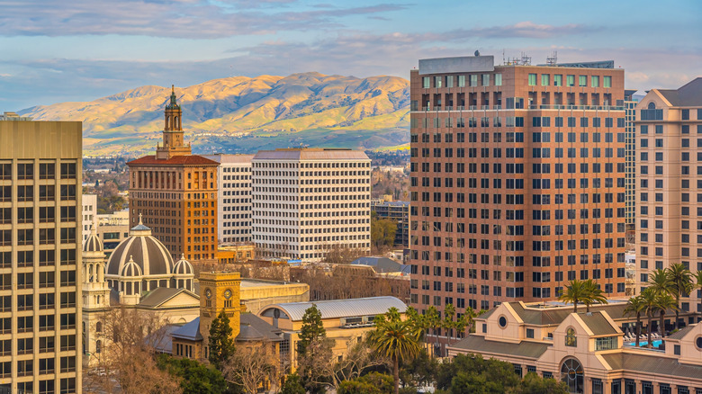 Downtown San Jose California from an aerial perspective with mountains in the background