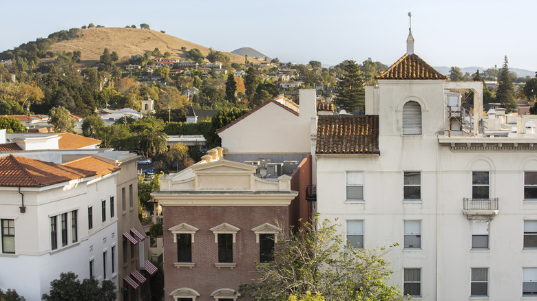 Aerial view of afternoon light shining on the historic buildings of downtown San Luis Obispo