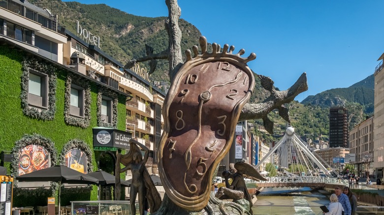 Andorra's famous Dali sculpture, The Nobility of Time, near greenery in the capital
