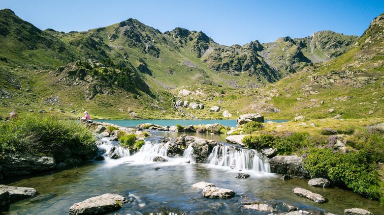 Two of the three Tristiania Lakes near El Serrat, Andorra, high in the mountains connected by a waterfall stream