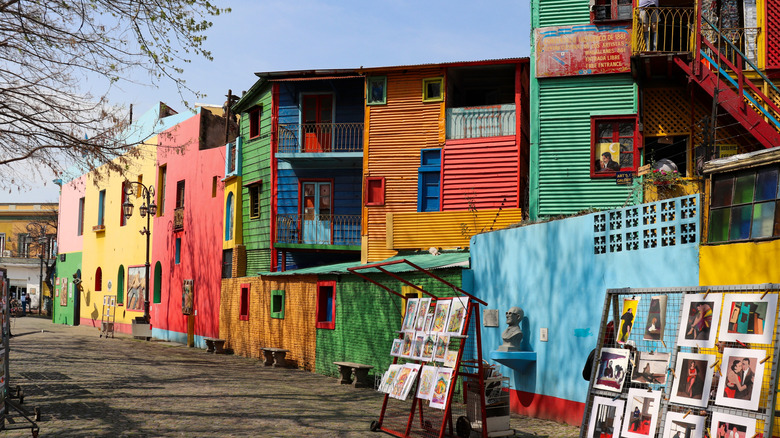 Colorful houses and artist stalls in the Caminito passage in the La Boca neighborhood, Buenos Aires