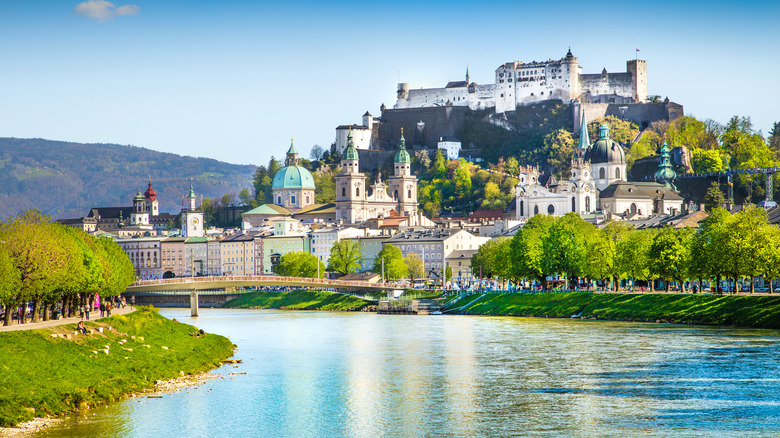 Beautiful view of Salzburg skyline with Festung Hohensalzburg and Salzach river in summer, Salzburg, Salzburger Land, Austria.