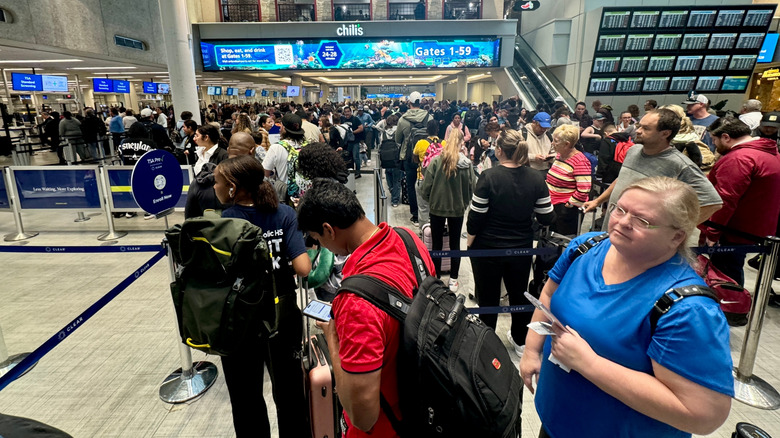 A busy airport security line at Orlando International Airport