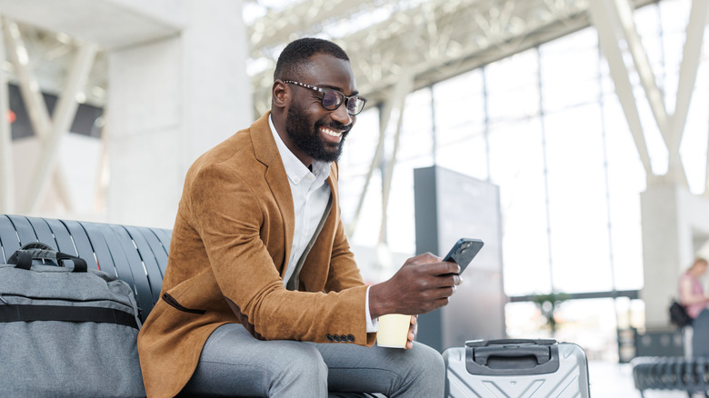 Person waiting for a flight at the airport
