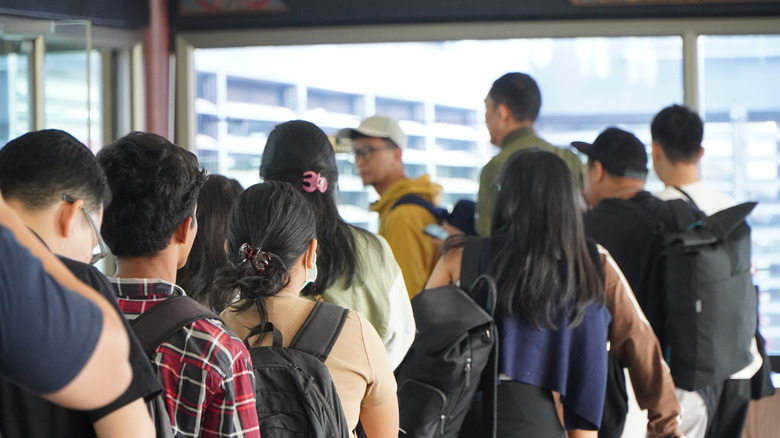 People waiting to board their flight