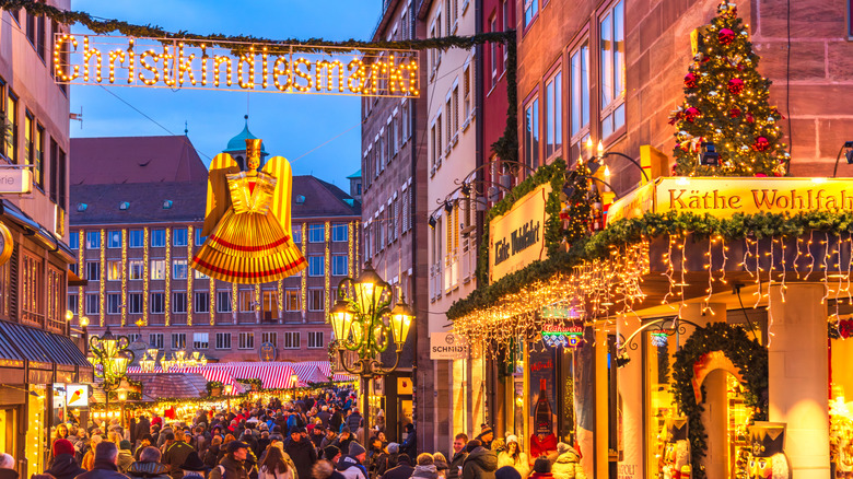 Lit up, crowded streets of Nuremberg's famous Christmas market, Germany