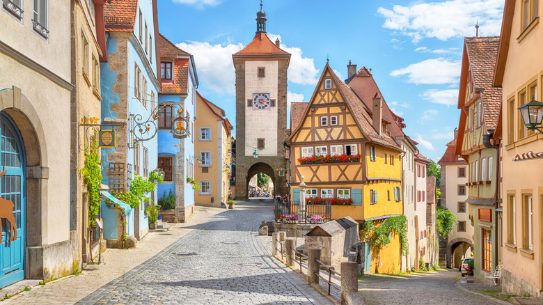 Iconic, colorful, half-timbered buildings and clock tower in Rothenburg ob der Tauber, Germany