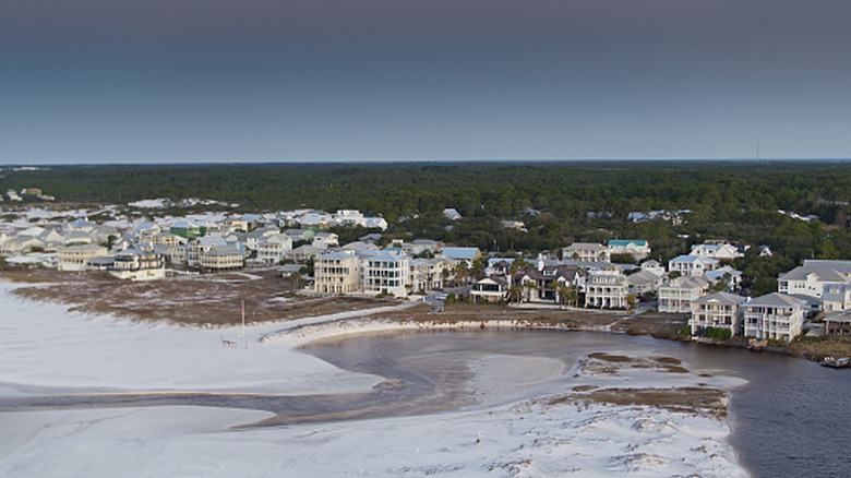 Aerial shot of beachfront buildings and coastal dunes in Grayton Beach, Florida, near Grayton Beach State Park