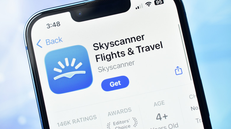 A detail of a phone's app store with the Skyscanner app