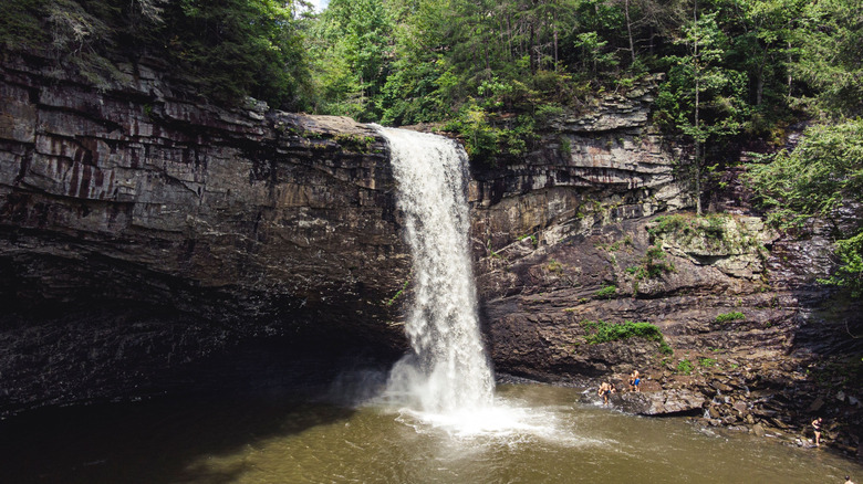 A beautiful scene of Foster Falls flowing down a cliff in Tennessee