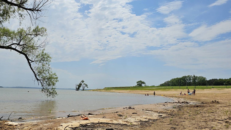 The sandy swimming beach area at Pioneer Park on Kaw Lake in Oklahoma