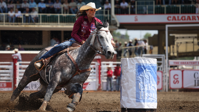 A competitor in the Calgary Stampede Women's Barrel Racing Championship