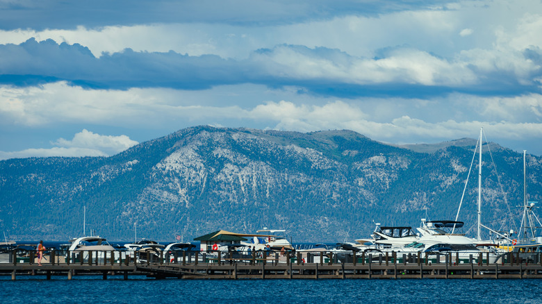 Boats sitting on the shore of Lake Tahoe in Tahoe City, California