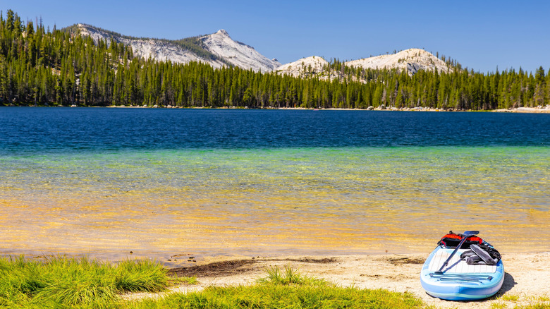 A boat on the beach at Tenaya Lake in Yosemite National Park, California
