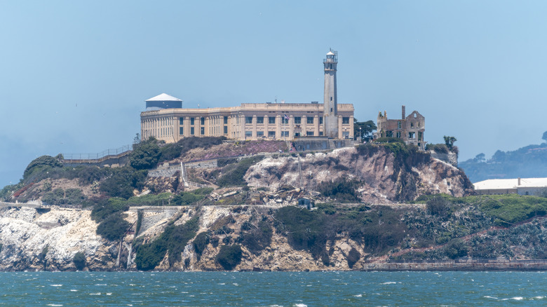 A scenic view of Alcatraz Prison on its rocky island