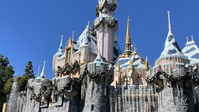 View of Sleeping Beauty Castle at Disneyland Resort with Christmas decorations