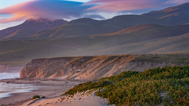 Colorful clouds and rolling hills above Jalama Beach in California.﻿