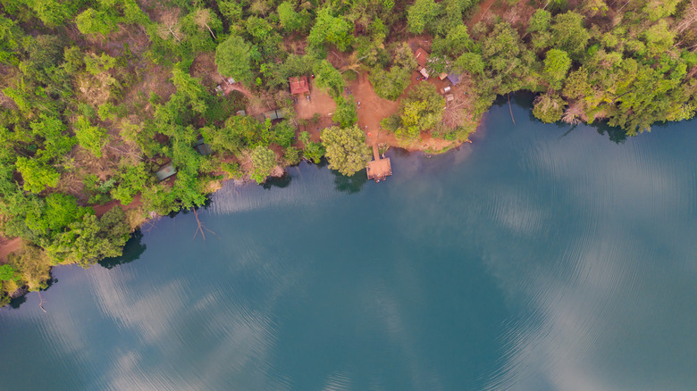 Aerial view of the shores of a volcanic lake in Cambodia's Ratanakiri Province