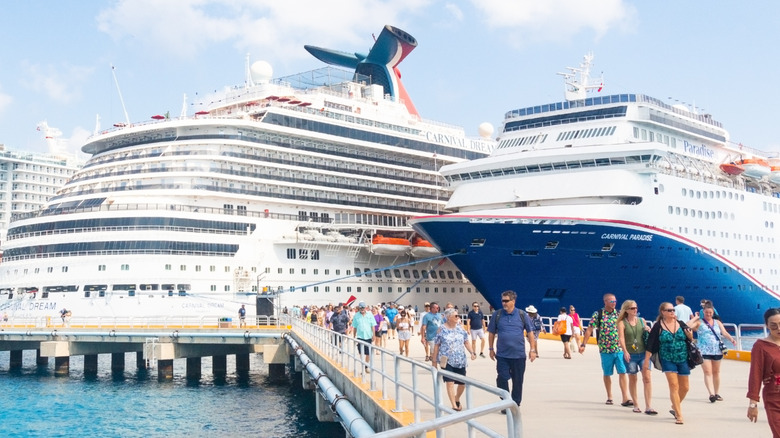 Passengers disembark from Carnival Dreams cruise ship