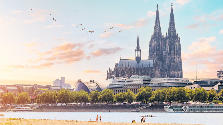 A view of the Cologne Cathedral from a Rhine River beach