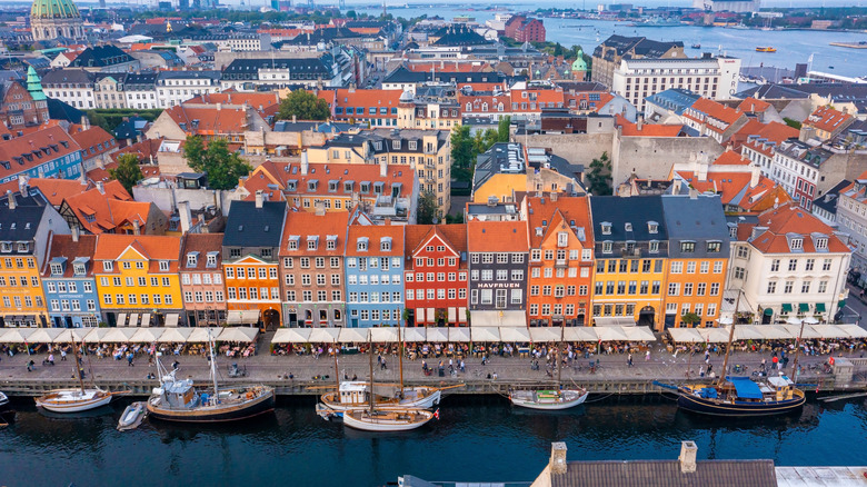 Aerial view of Nyhavn and Copenhagen's harbor district with colorful buildings and canals