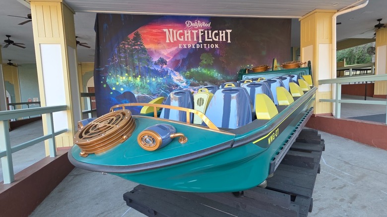 A teal-colored car on display from the Dollywood NightFlight Expedition ride