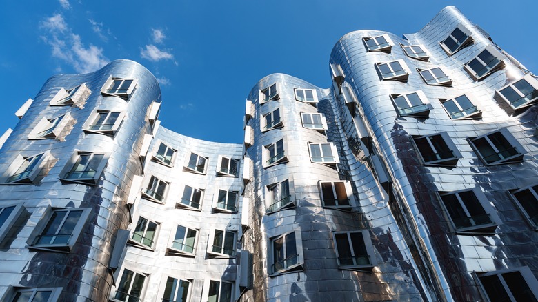 Silver metallic Gehry building reflecting sunlight in the Medienhafen district of Dusseldorf
