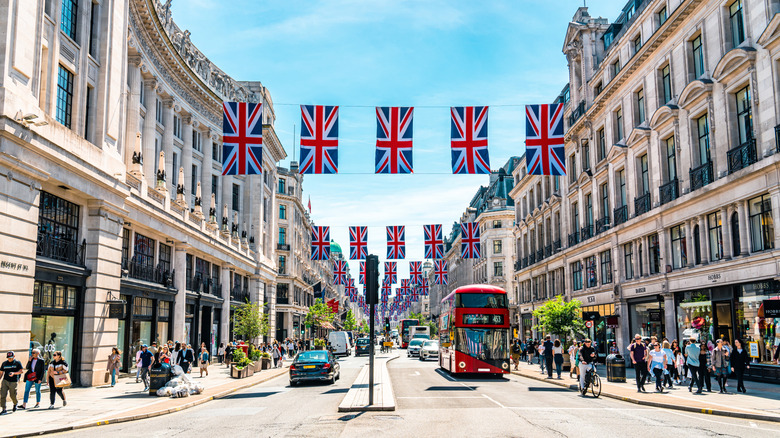 Oxford Street in the summer with hanging British flags.