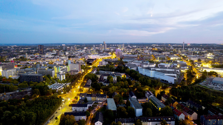 Aerial view of Essen at twilight with street lights on