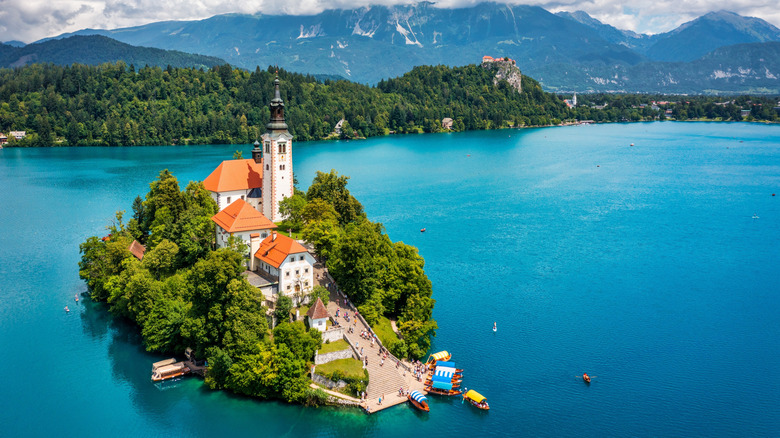 Aerial view of Lake Bled, Slovenia, with its iconic castle, island, and mountain views