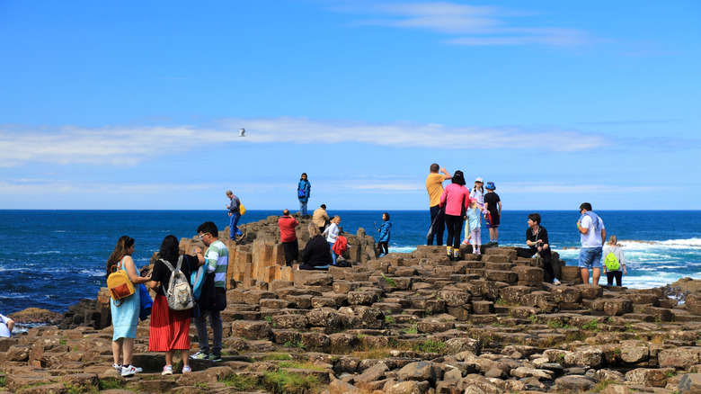 People visiting the Giant's Causeway in Northern Ireland