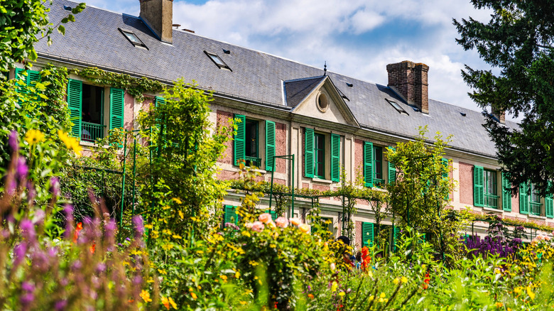 The facade and garden of Claude Monet's house in Giverny