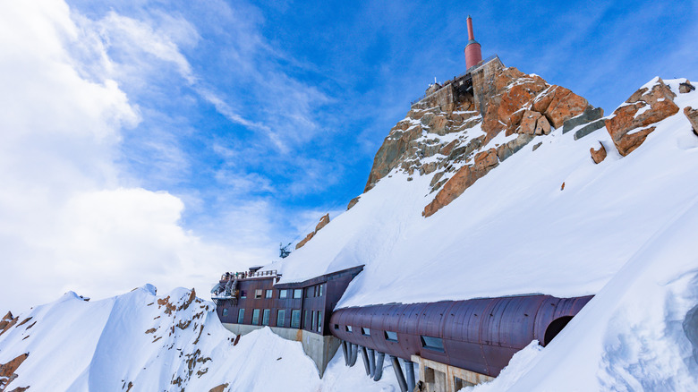 the summit of mont blanc with snow-covered buildings