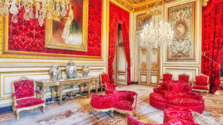 interior view of red and gold accented Napoleon apartments