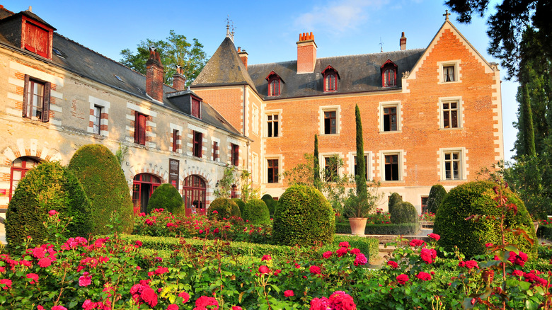 The Château du Clos Lucé with roses bushes in foreground